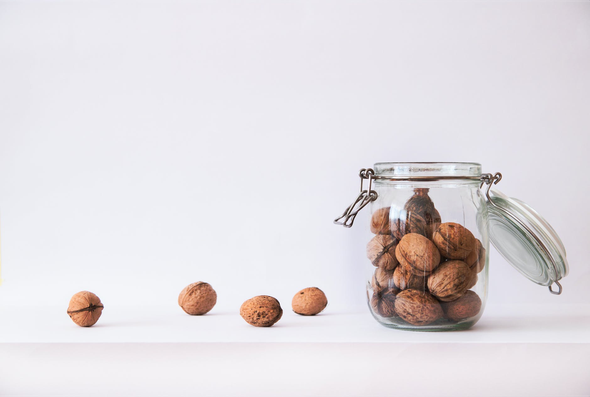 walnut in clear glass jar