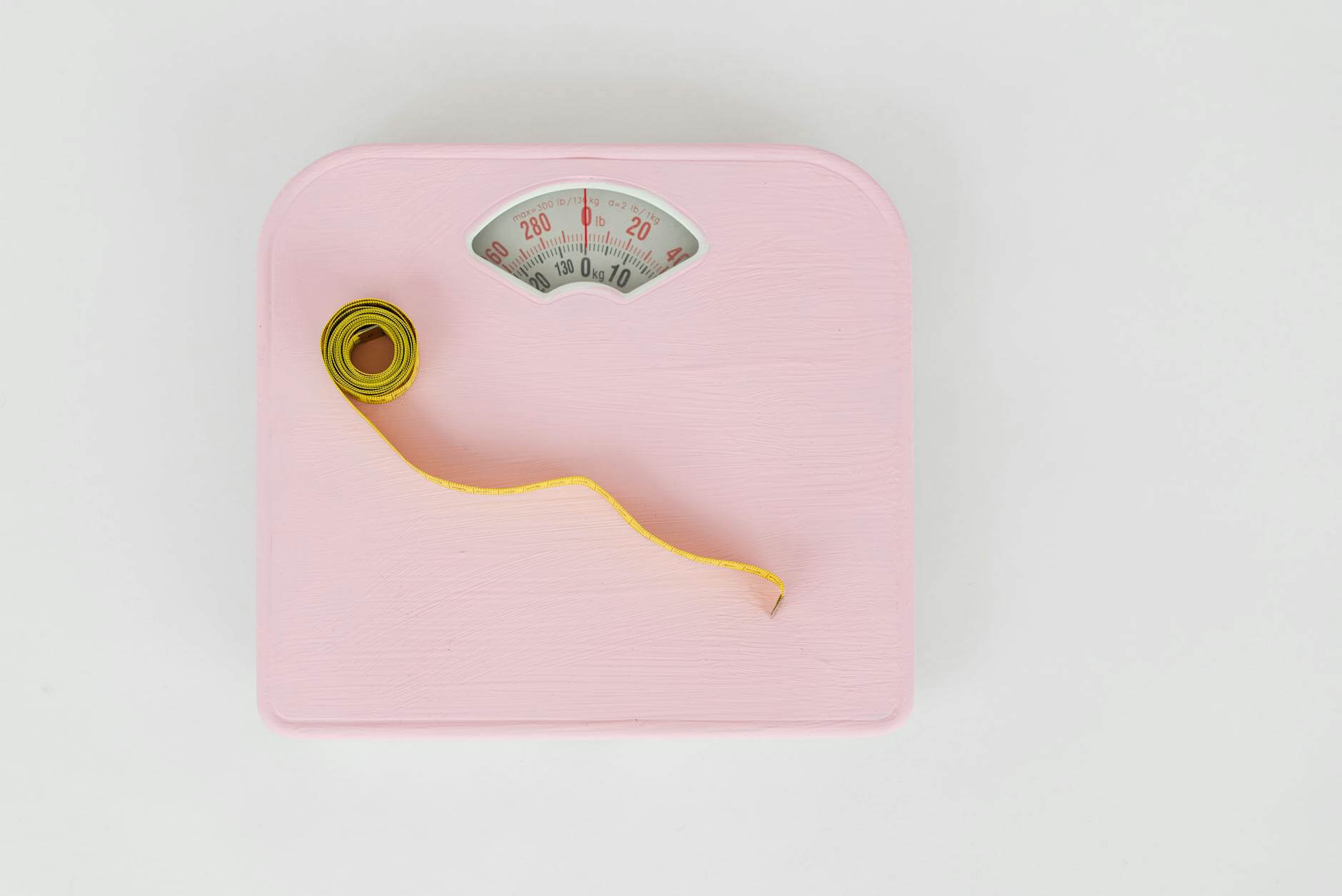 measuring tape on a weighing scale