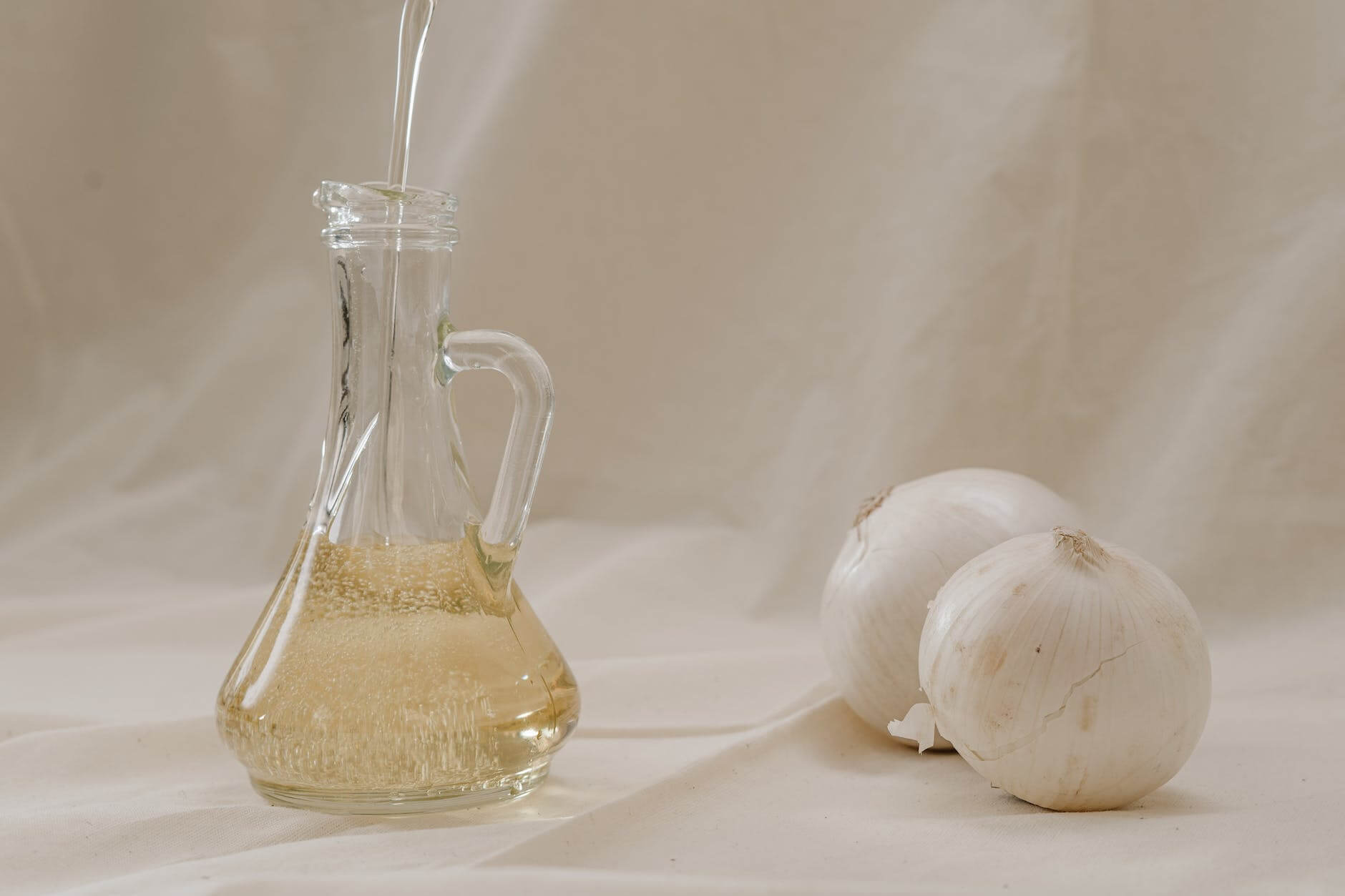 olive oil in a clear glass jar