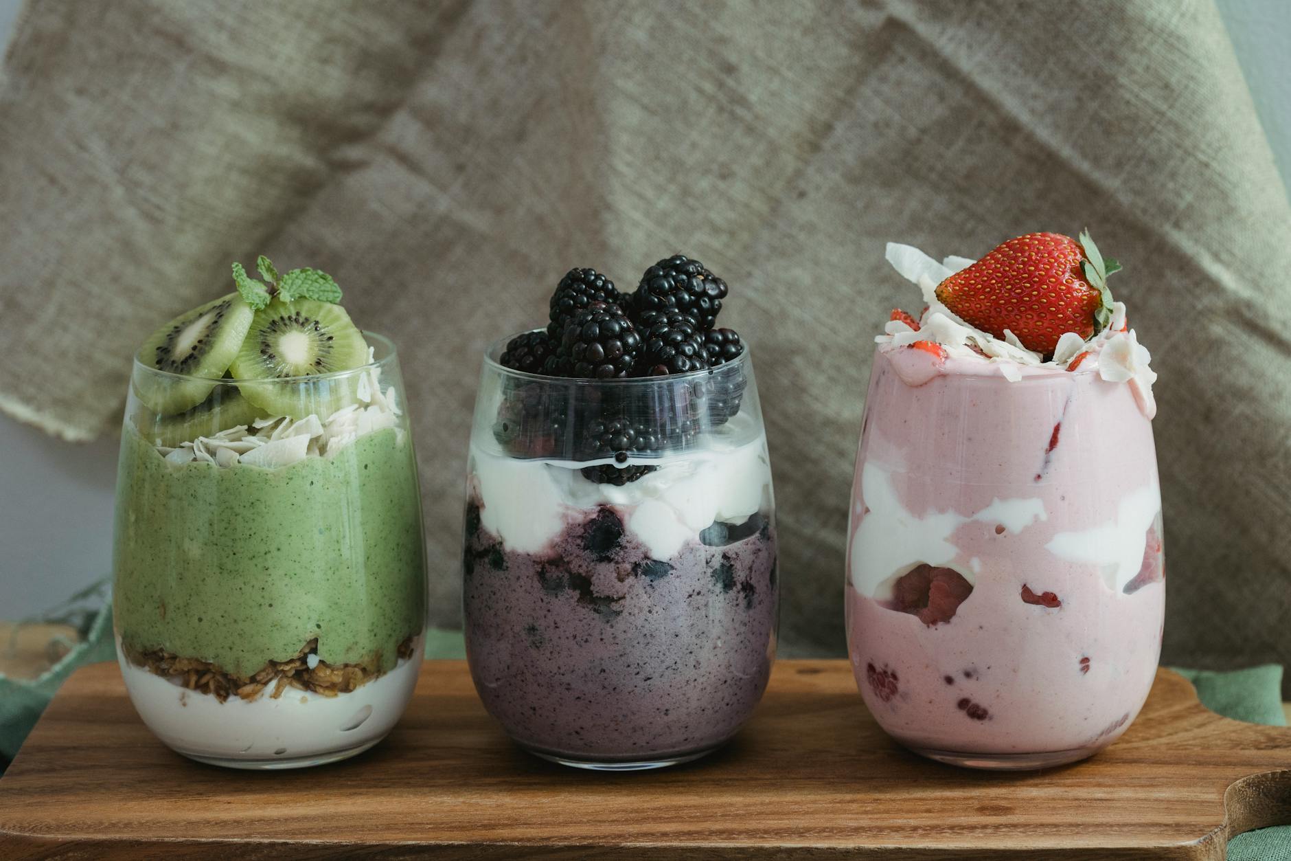 fresh fruits with yogurt in clear glass